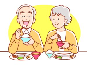 美味しく食事をする高齢者